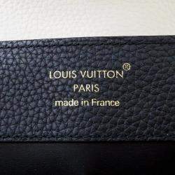 Pre Owned حقيبة لوي فيتون كابوسينز MM جلد توريلون أسود/كريم/غال أسود