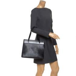 Louis Vuitton, a black epi Croisette PM handbag, designed with a structured  shape with a textured bl