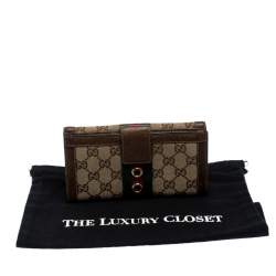 Gucci Brown/Beige GG Canvas Web Eyelet Flap Wallet