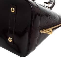 مملوكة مسبقًا حقيبة لوي فيتون ألما فيرنيه أمارنت مونوغرامي GM