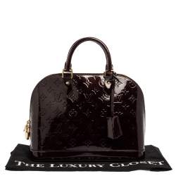 مملوكة مسبقًا حقيبة لوي في تون "ألما " جلد مونوغرامى عنابية PM