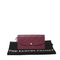 مملوكة مسبقًا محفظة لوي فيتون "ايميلي" جلد مطبوع مونوغرامي عنابي