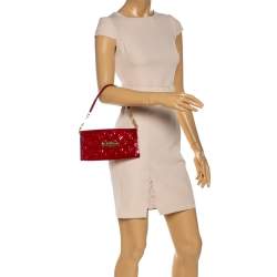 مملوكة مسبقًا حقيبة لوي فيتون "صنست بوليفارد" جلد لامع مونوغرامي أحمر