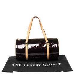 مملوكة مسبقًا حقيبة لوي فيتون "بيدفورد" جلد لامع مونوغرامي عنابية