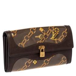 مملوكة مسبقًا محفظة لوي فيتون بورت موني مونوغرامي بنية إصدار محدود بدلاية 