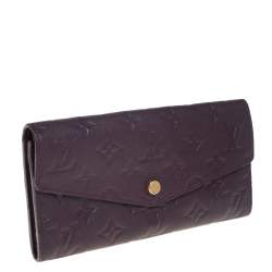 Pre Owned Louis Vuitton Flamme Monogram Empreinte Leather Sarah Wallet