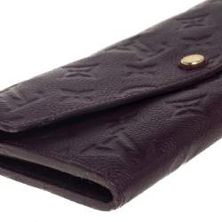 Pre Owned Louis Vuitton Flamme Monogram Empreinte Leather Sarah Wallet