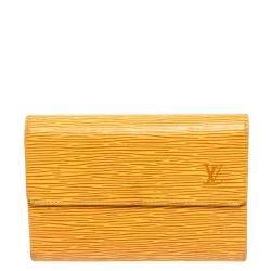 Lot - A yellow epi leather shoulder bag and belt, Louis Vuitton