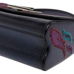 مملوكة مسبقًا حقيبة لوي فيتون تويست ترتر وجلد إيبي أزرق داكن مزين لهب 