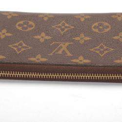 Pre Owned Louis Vuitton Monogram canvas Zippy Wallet