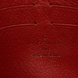 مملوكة مسبقًا حقيبة كلتش لوي فيتون بوشيت بالاس كانفاس مونوغرامي برتقالي 