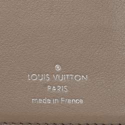Pre Owned Louis Vuitton Magnolia Leather Capucines Compact Wallet