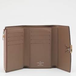 Pre Owned Louis Vuitton Magnolia Leather Capucines Compact Wallet