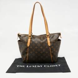 مملوكة مسبقًا حقيبة لوي فيتون توتالي كانفاس مونوغرامي PM