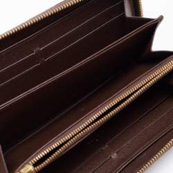 مملوكة مسبقًا محفظة غوتشي زيبي مونوغرام إيديل بني
