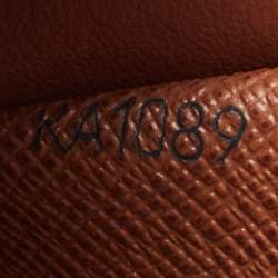 مملوكة مسبقًا محفظة لوي فيتون بورت موناي تريسور كانفاس مونوغرامي