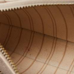 Pre Owned Louis Vuitton Creme Monogram Empreinte Leather Easy Pouch on Strap