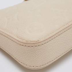 Pre Owned Louis Vuitton Creme Monogram Empreinte Leather Easy Pouch on Strap