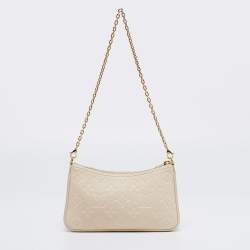 Pre Owned Louis Vuitton Creme Monogram Empreinte Leather Easy Pouch on Strap