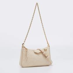Pre Owned Louis Vuitton Creme Monogram Empreinte Leather Easy Pouch on Strap