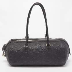 مملوكة مسبقًا Louis Vuitton Black Monogram Revelation Neo Papillon GM Bag