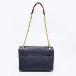 Pre Owned Louis Vuitton Marine Rouge Monogram Empreinte Leather Vavin PM Bag