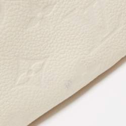 Pre Owned Louis Vuitton Neige Monogram Empreinte Leather Artsy MM Bag