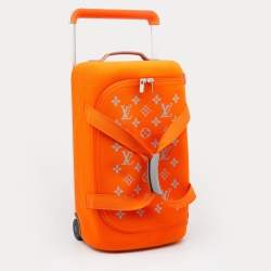 Pre Owned Louis Vuitton Orange Monogram Knit Horizon Soft 55 Duffle Bag