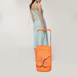 Pre Owned Louis Vuitton Orange Monogram Knit Horizon Soft 55 Duffle Bag