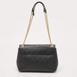 Pre Owned Louis Vuitton Black Monogram Empreinte Leather Vavin MM Bag