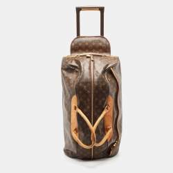 A Louis Vuitton Monogram Canvas Eole 50 Rolling Travel Bag, 19 x 11.5 x  12; Handle drop: 4.5.