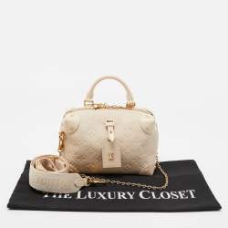 Pre Owned Louis Vuitton Neige Monogram Empreinte Leather Petite Malle Souple Bag