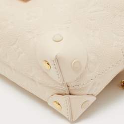 Pre Owned Louis Vuitton Neige Monogram Empreinte Leather Petite Malle Souple Bag