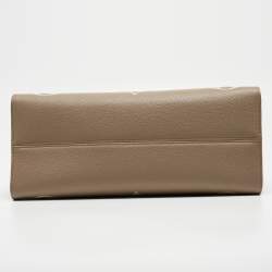 Pre Owned Louis Vuitton Bicolor Monogram Empriente Leather Giant Onthego MM Bag