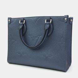 Pre Owned Louis Vuitton Blue Giant Monogram Empreinte Leather OnTheGo PM Tote Bag