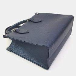 Pre Owned Louis Vuitton Blue Giant Monogram Empreinte Leather OnTheGo PM Tote Bag