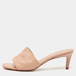 مملوكة مسبقًا Louis Vuitton Beige Monogram Embossed Leather Revival Slide Sandals Size 40
