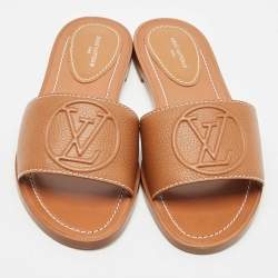 Pre Owned Louis Vuitton Brown Leather Lock It Flat Slides Size 37