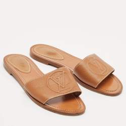 Pre Owned Louis Vuitton Brown Leather Lock It Flat Slides Size 37