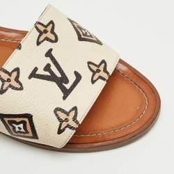 Pre Owned Louis Vuitton Cream Monogram Embossed Leather Revival Flat Slides Size 37