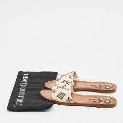 Pre Owned Louis Vuitton Cream Monogram Embossed Leather Revival Flat Slides Size 37
