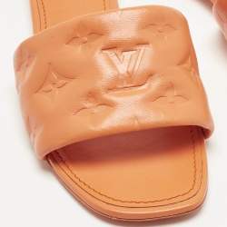 Pre Owned Louis Vuitton Orange  Monogram Embossed Leather Revival Flat Slides Size 39