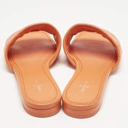 Pre Owned Louis Vuitton Orange  Monogram Embossed Leather Revival Flat Slides Size 39