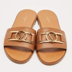Pre Owned Louis Vuitton Brown Leather Lock It Flat Sandals Size 39