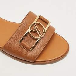 Pre Owned Louis Vuitton Brown Leather Lock It Flat Sandals Size 39