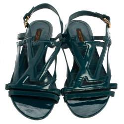 مملوكة مسبقًا Louis Vuitton Teal Blue Patent Leather Crossing Logo Flat Sandals Size 40