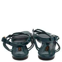 مملوكة مسبقًا Louis Vuitton Teal Blue Patent Leather Crossing Logo Flat Sandals Size 40