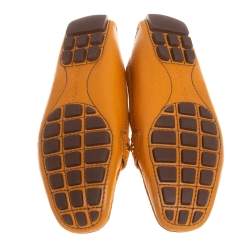 مملوكة مسبقًا Louis Vuitton Orange Leather Logo Embellished Driving Loafer Size 35.5