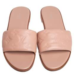 Pre Owned Louis Vuitton Beige Monogram Embossed Leather Revival Flat Flat Mule Size 38