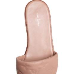 Pre Owned Louis Vuitton Beige Monogram Embossed Leather Revival Flat Flat Mule Size 38